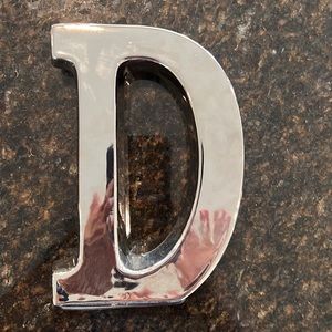 Letter D accent